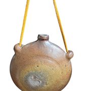 Old stoneware flask known as a toad from the 19th century.