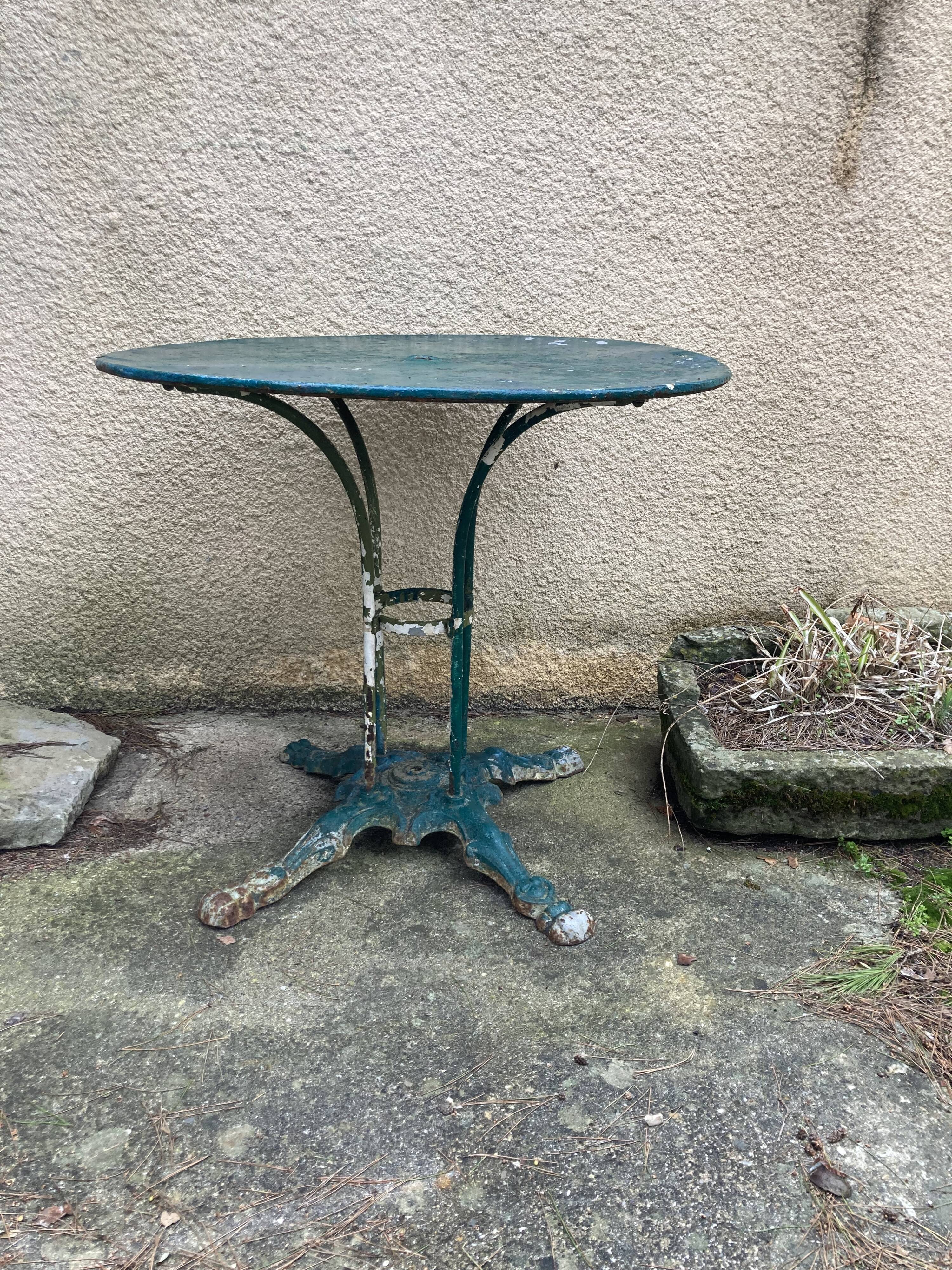 Old wrought iron garden table