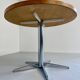 Old round table in solid wood and metal, vintage 70s design