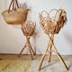 Pair of vintage rattan "Diabolo" plant stands from the 1960s.