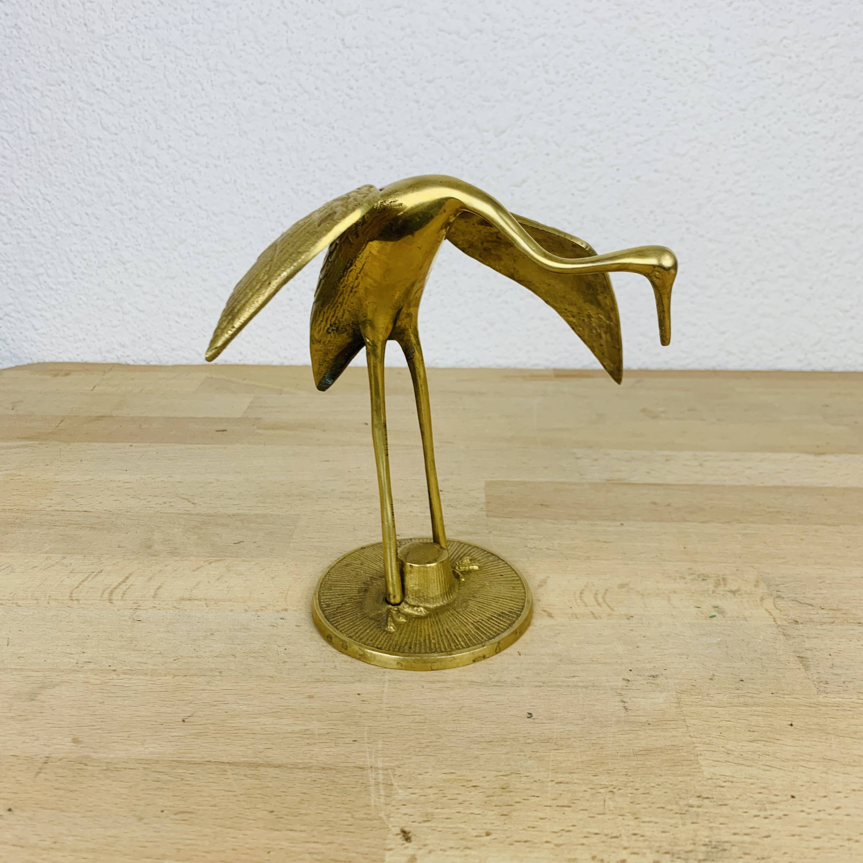 Vintage golden brass heron