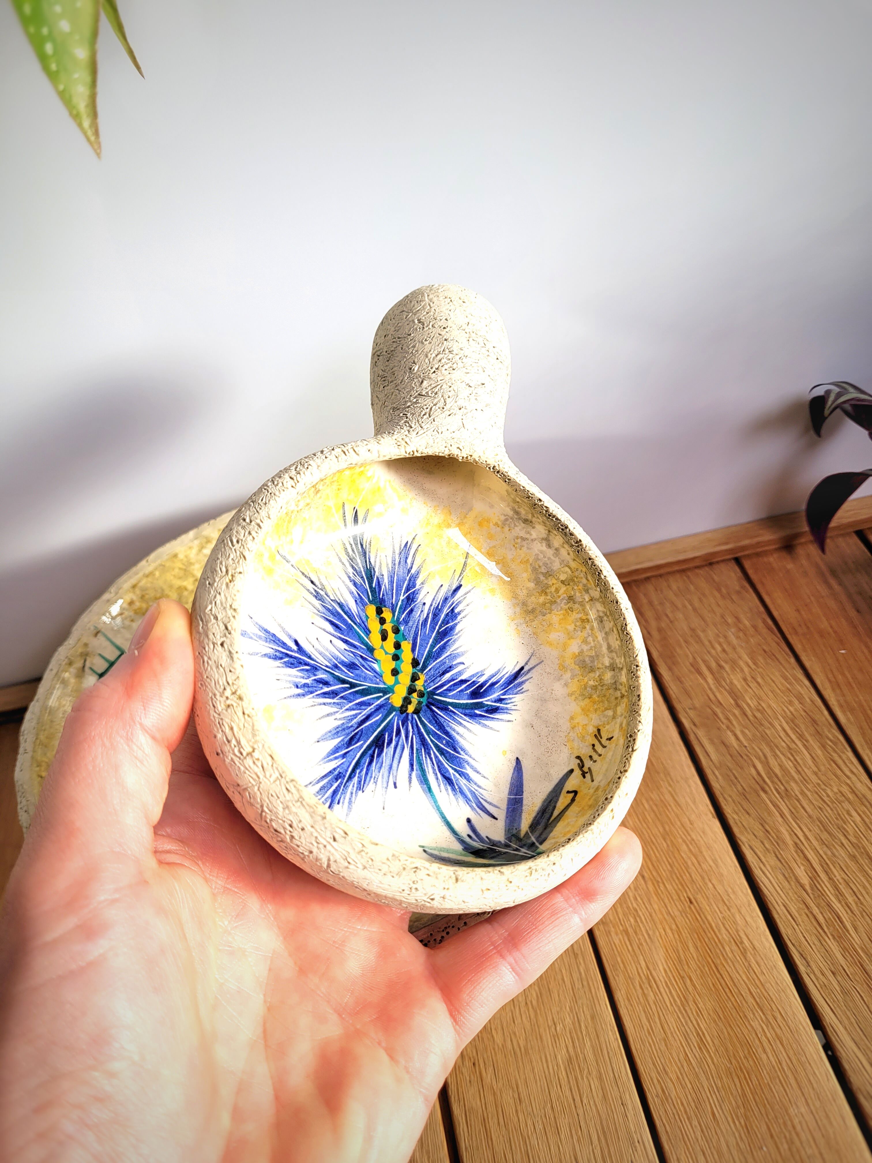 Pair of blue thistle ceramics