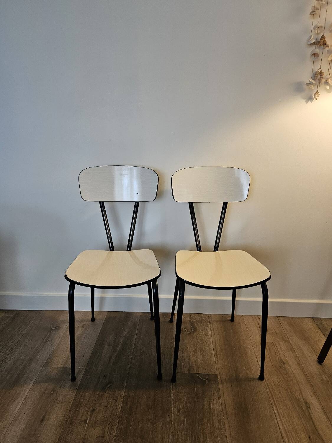 Pair of white formica chairs