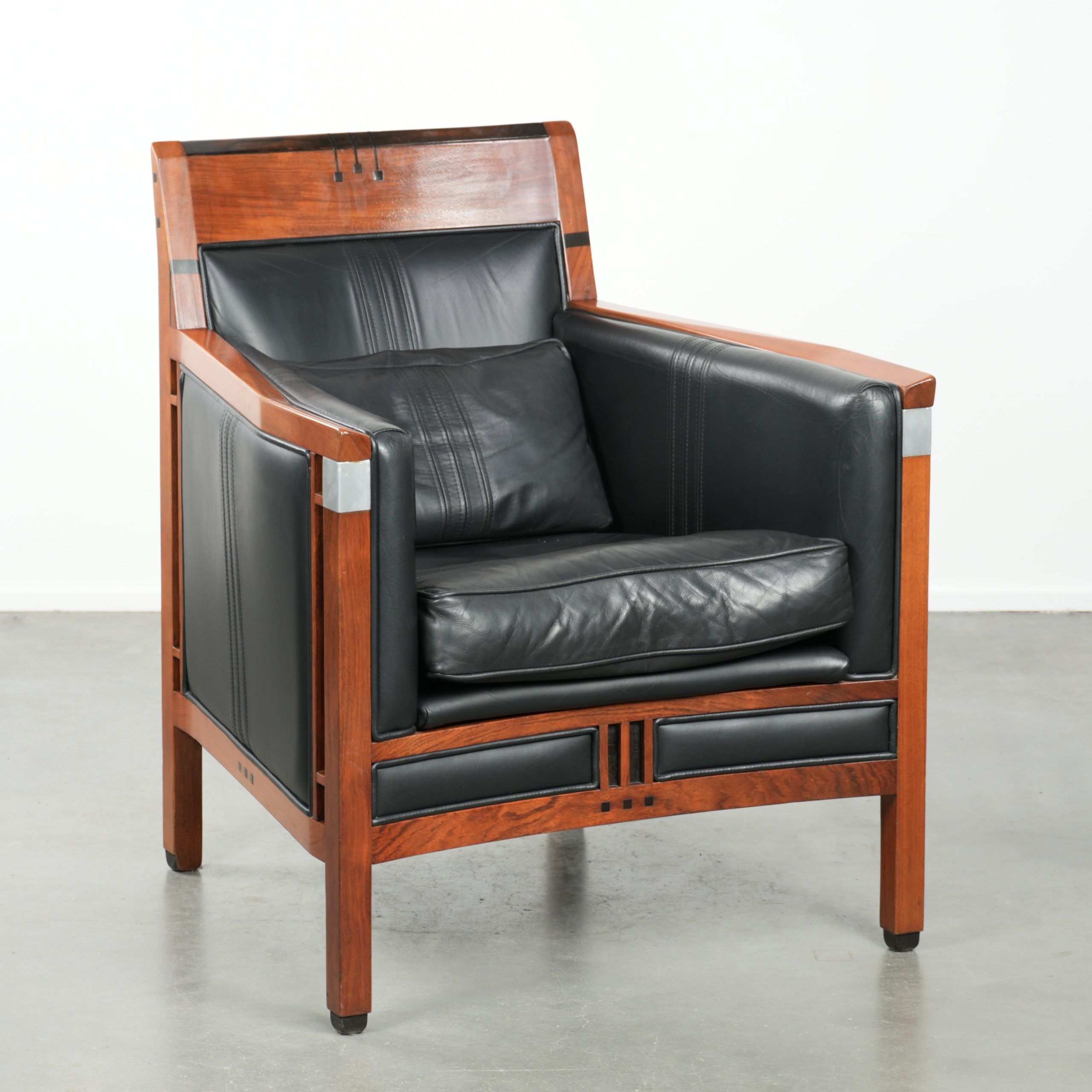 Black leather Art Deco design armchair in good condition