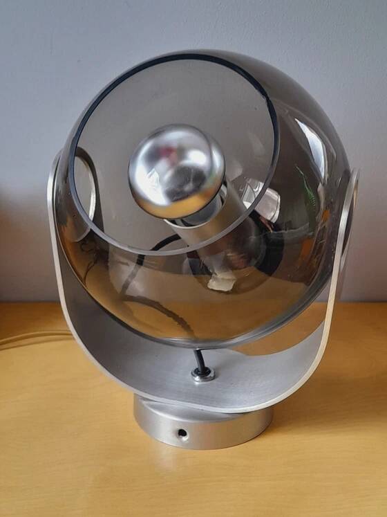 Space age lamp in chrome metal and smoked glass from the 1970s.