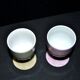 Set of 2 vintage pastel porcelain egg cups - yellow and iridescent pink
