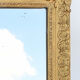 Miroir en bois et stuc doré - 113x83cm