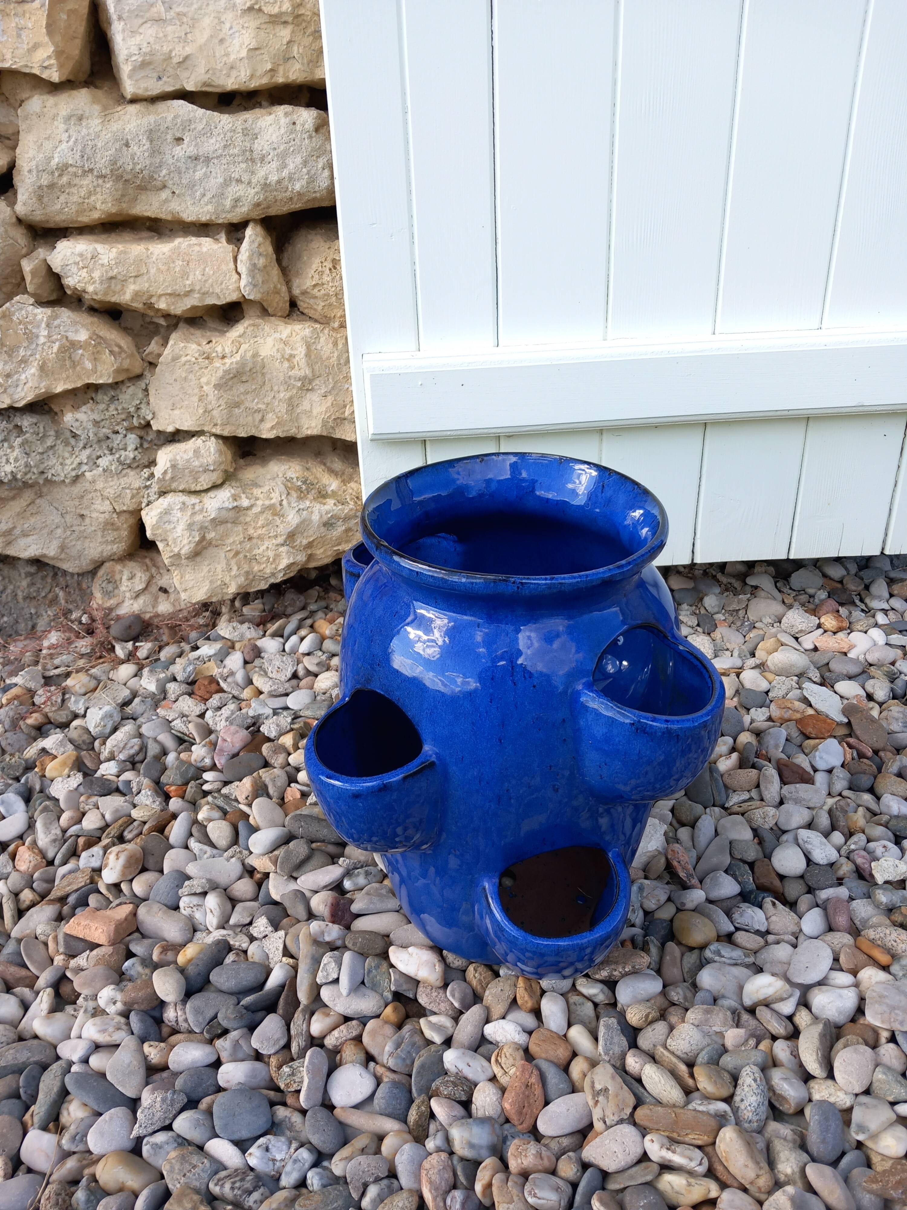 Blue glazed terracotta strawberry pot