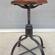 Bienaise stool of the years 1935, model 203 with 4 flat iron cathedral legs joined by a