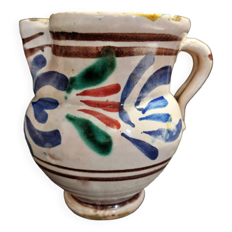 Old earthenware pitcher late 19th century