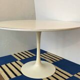 White dining table with tulip base by Maurice Burke