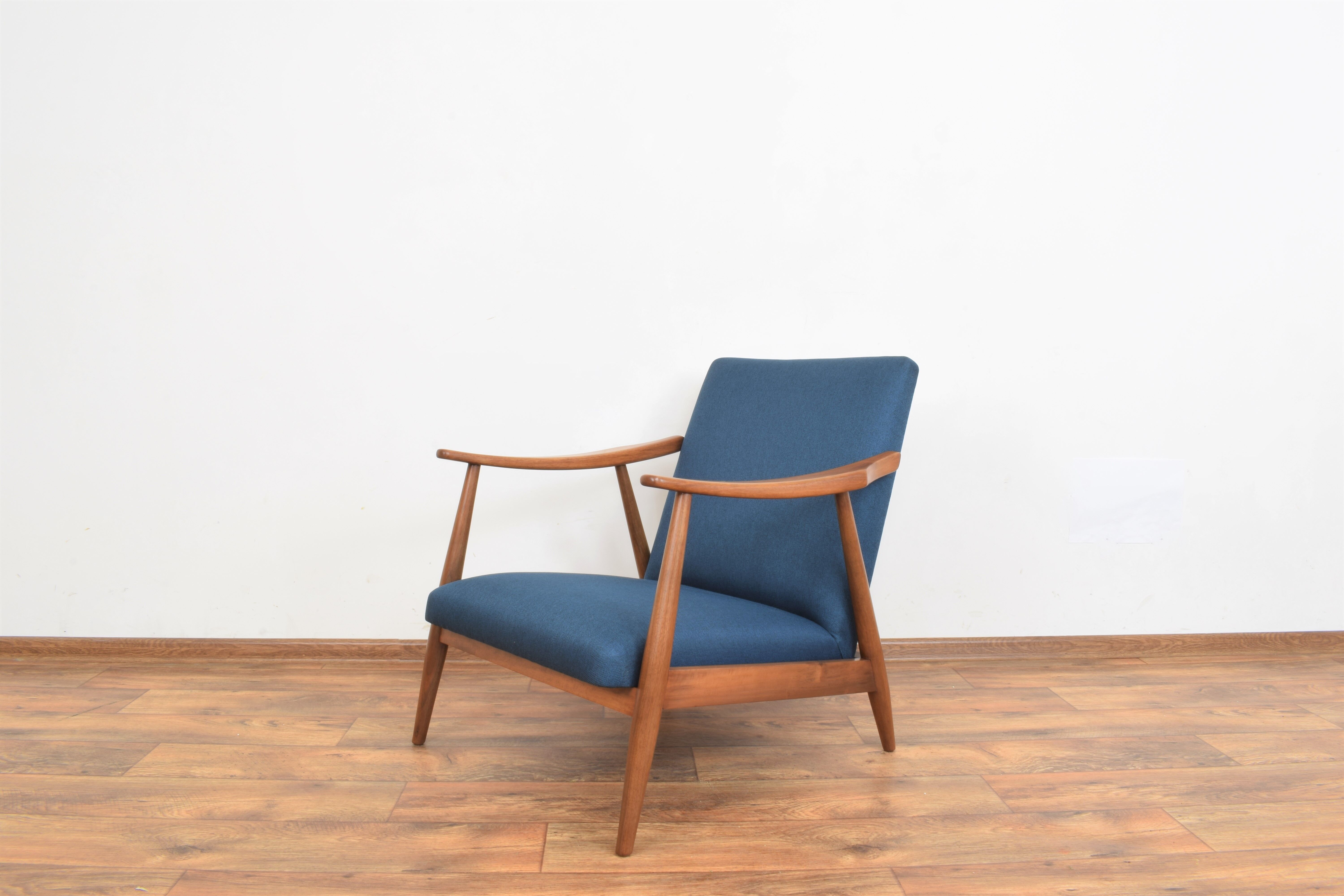 Teak desk and walnut armchair
