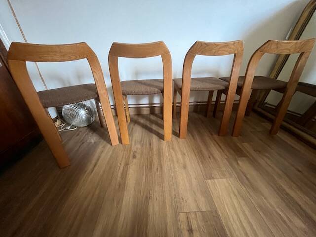 4 brown chairs