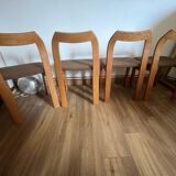 4 brown chairs