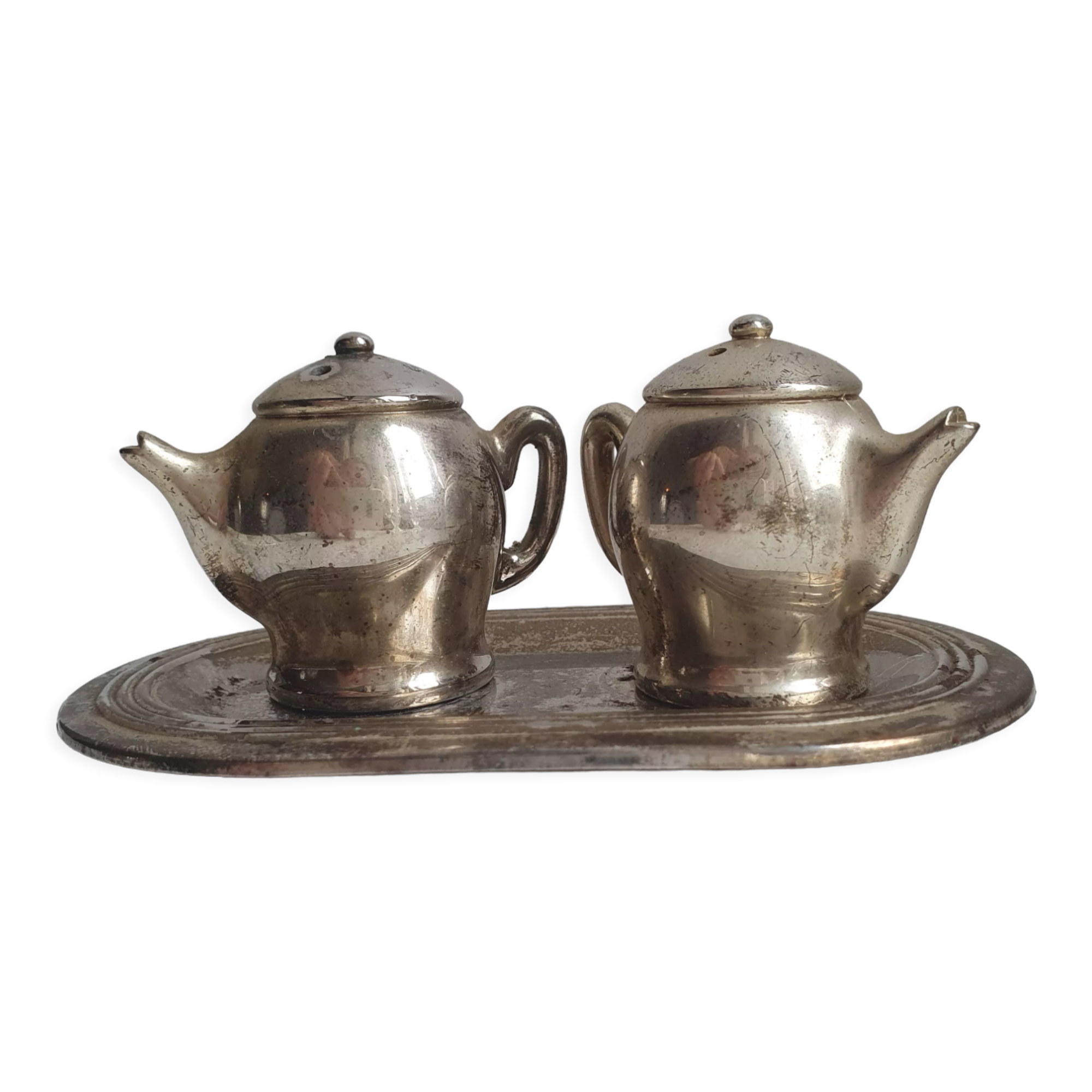 Ensemble trois pièces salière et poivrière  théières miniatures