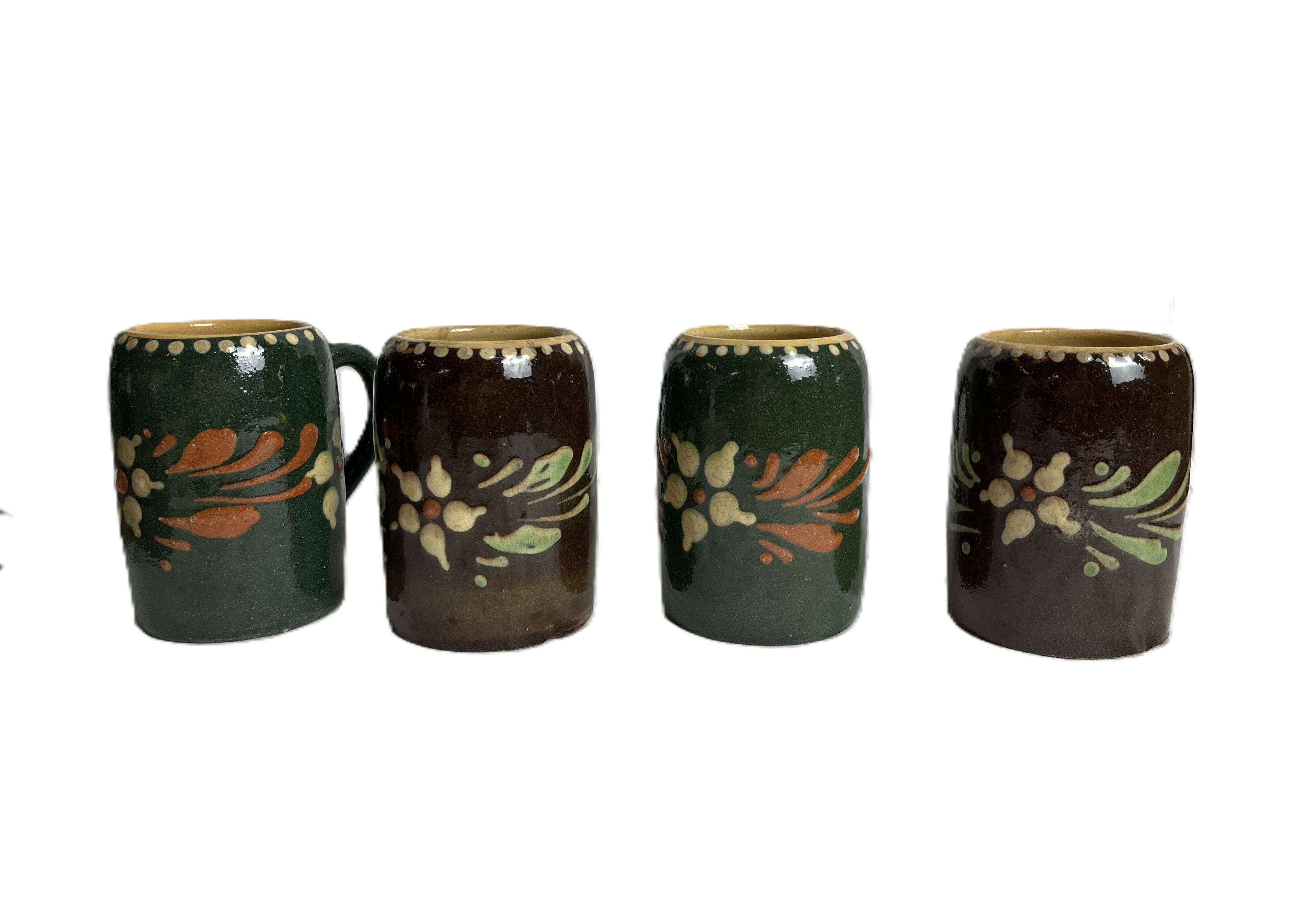 Alsatian pottery, glazed stoneware mug from Soufflenheim, 20th century.