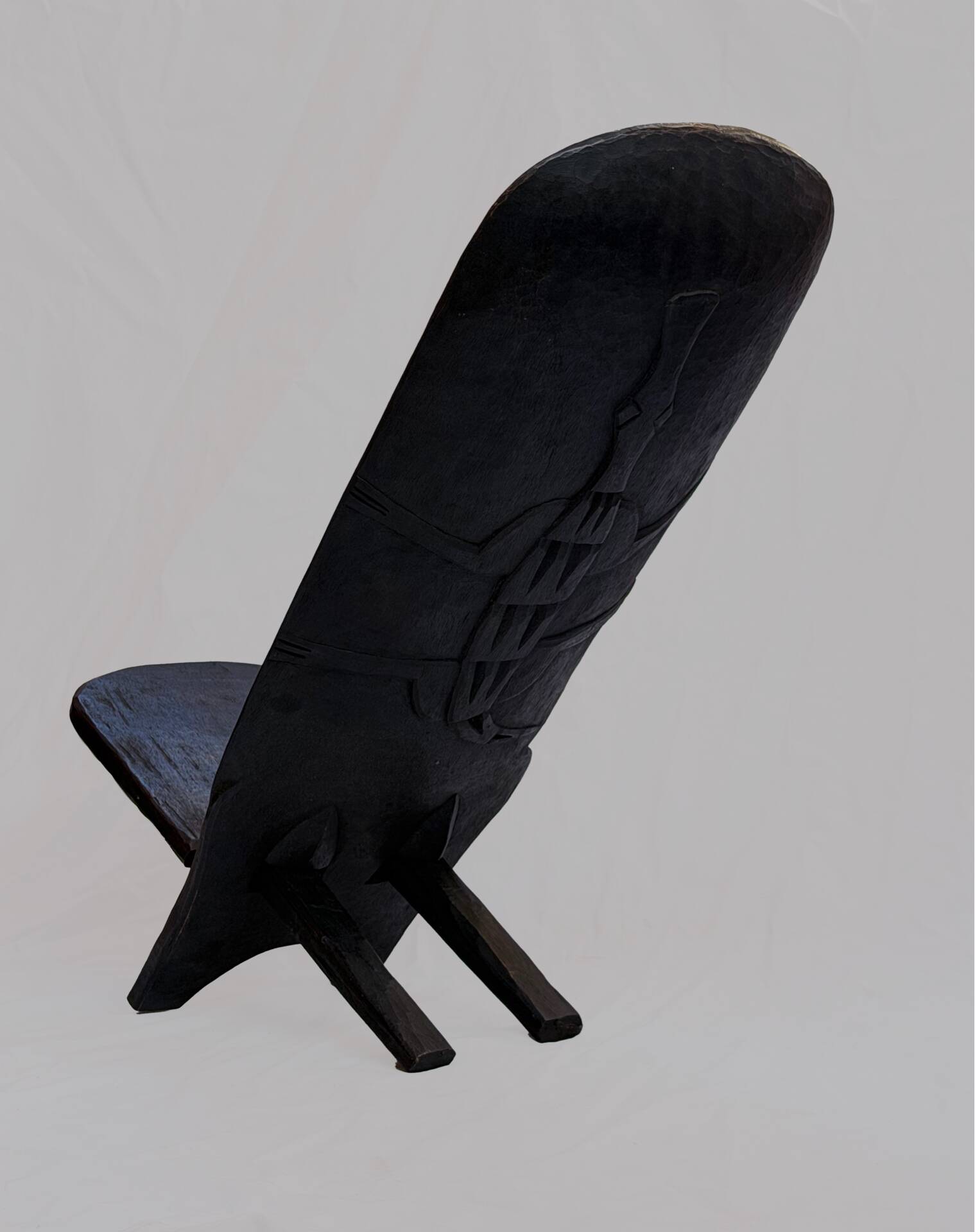 African wooden talking chair – Handmade armchair from Burkina Faso