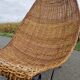 Large vintage metal and wicker armchair