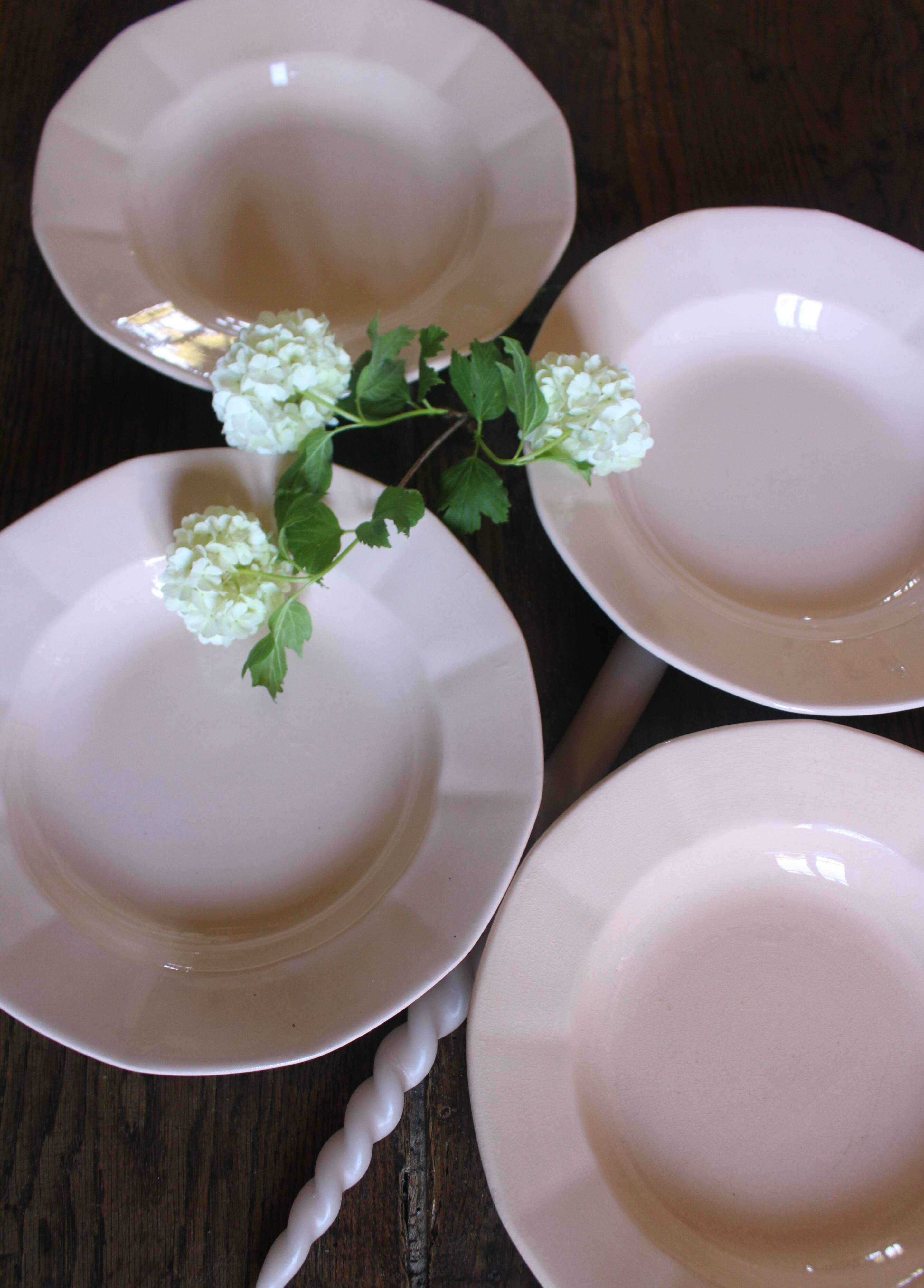 A set of 4 pink deep plates from Digoin Sarreguemines.
