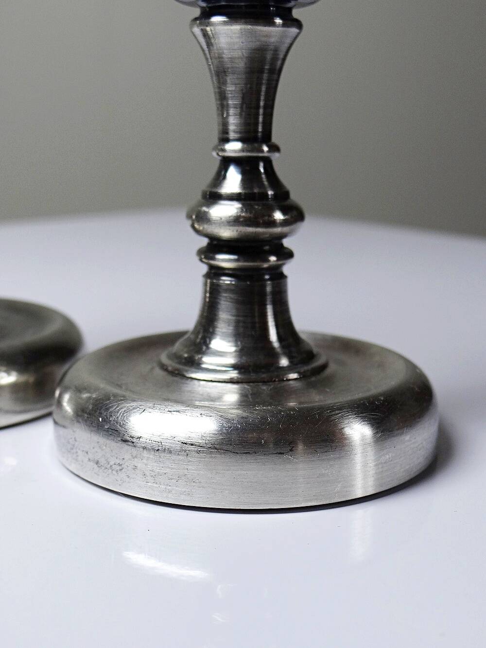 Pair of small antique silver-plated candlesticks, Georgian style.