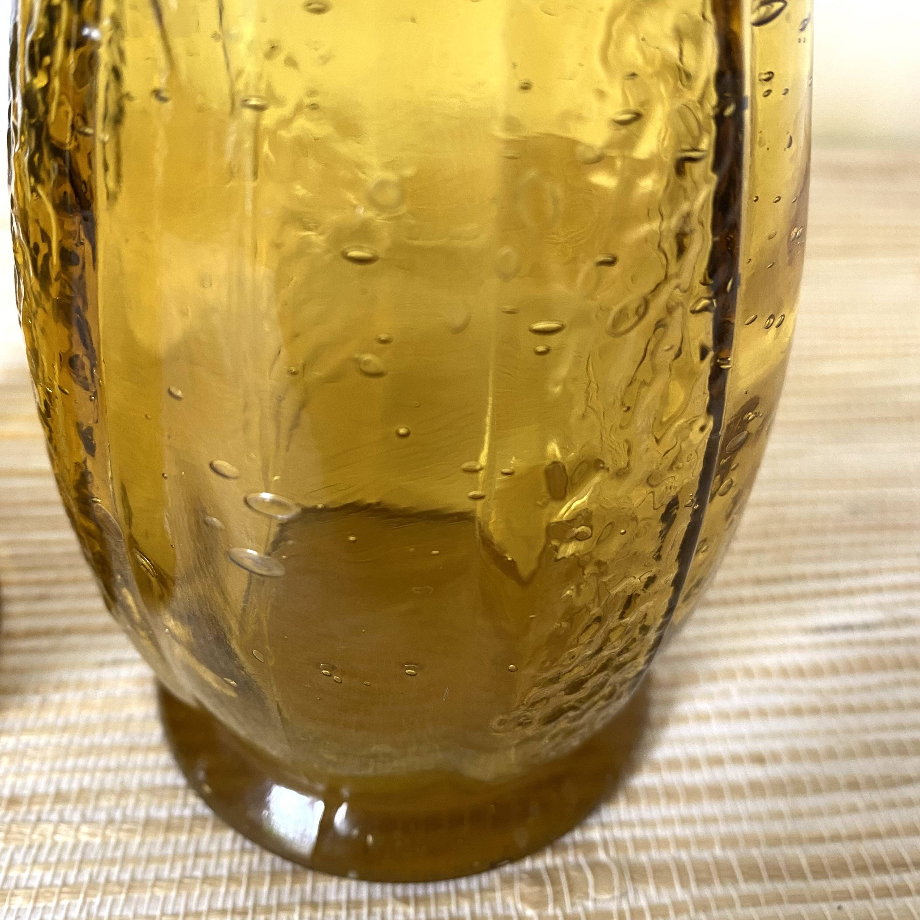 Paire de vases à jacinthe en verre ambré bullé