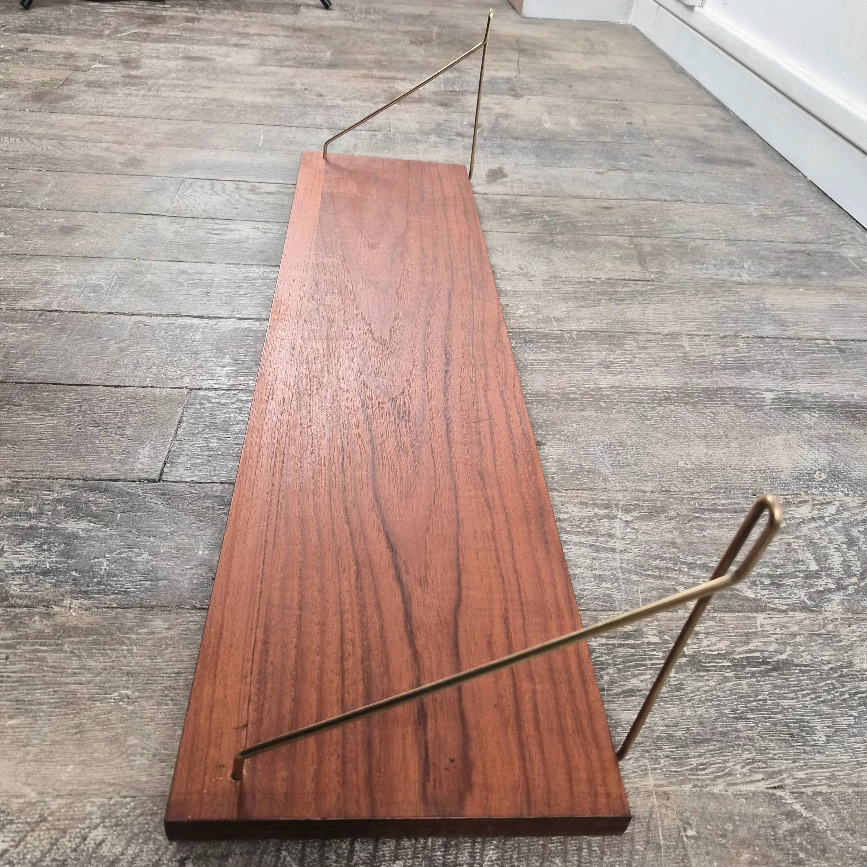 Teak shelf with brass supports, Denmark, 1960.