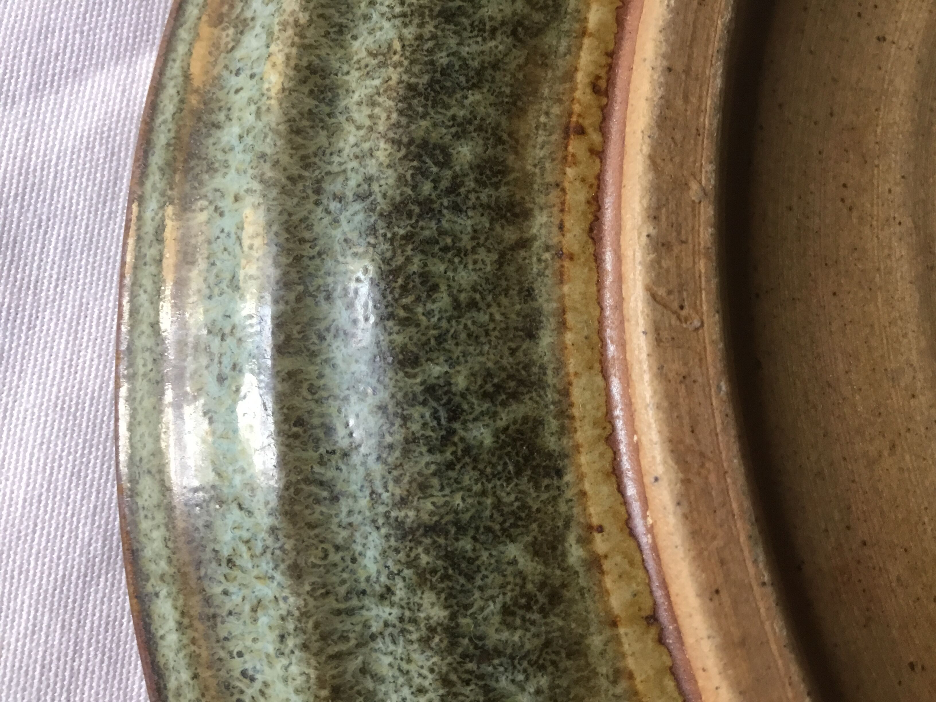 Emailed sandstone plate