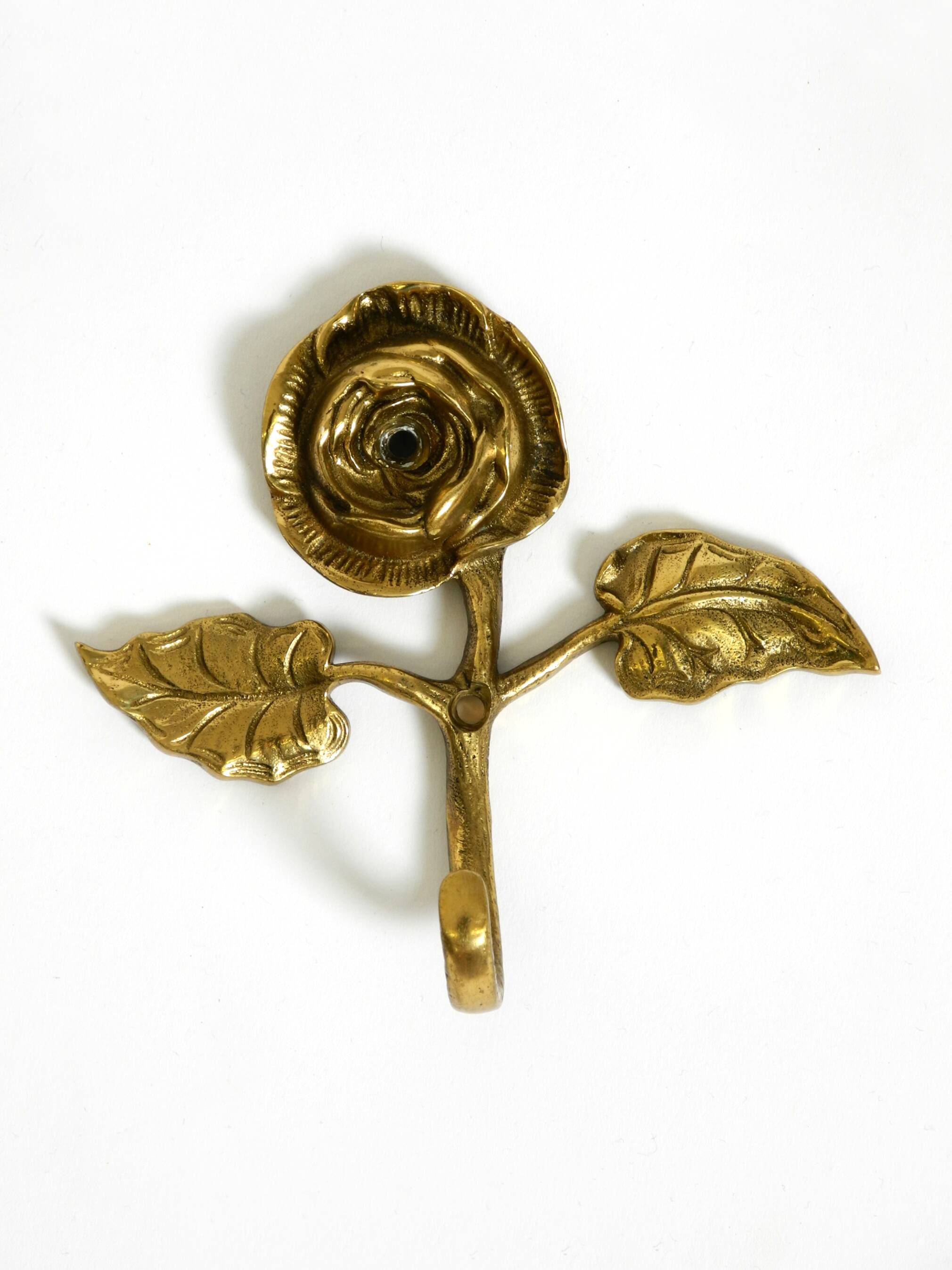 Set of five beautiful, solid mid-century brass rose wall coat hooks