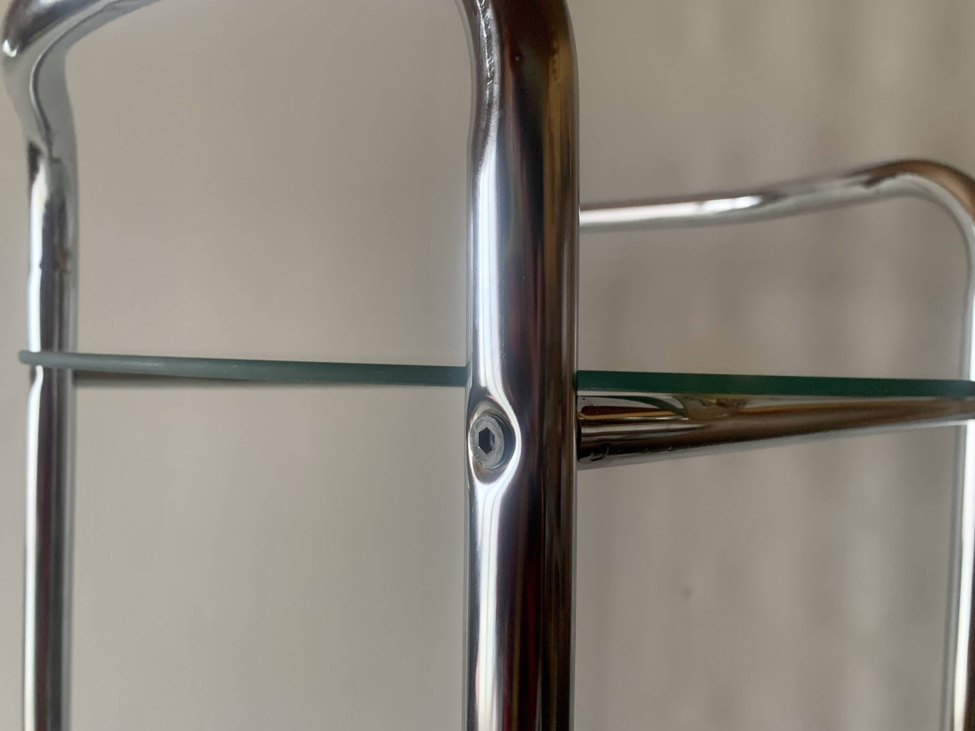 Pedestal table, vintage chrome steel saddle with 2 round windows