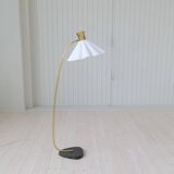 Curved mid-century floor lamp in brass and stone