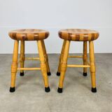 Pair of brutalist solid wood stools