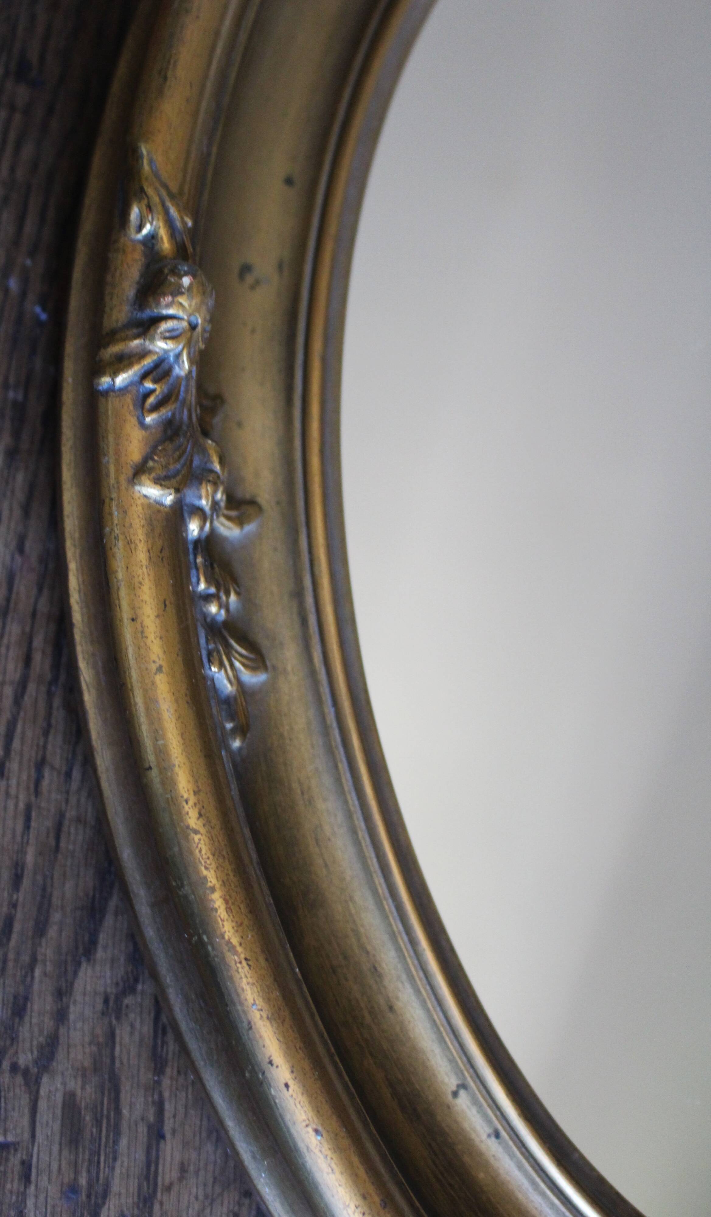 Golden Oval Mirror with Bow and Roses Decor