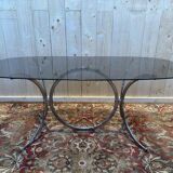Contemporary glass and chrome dining table.