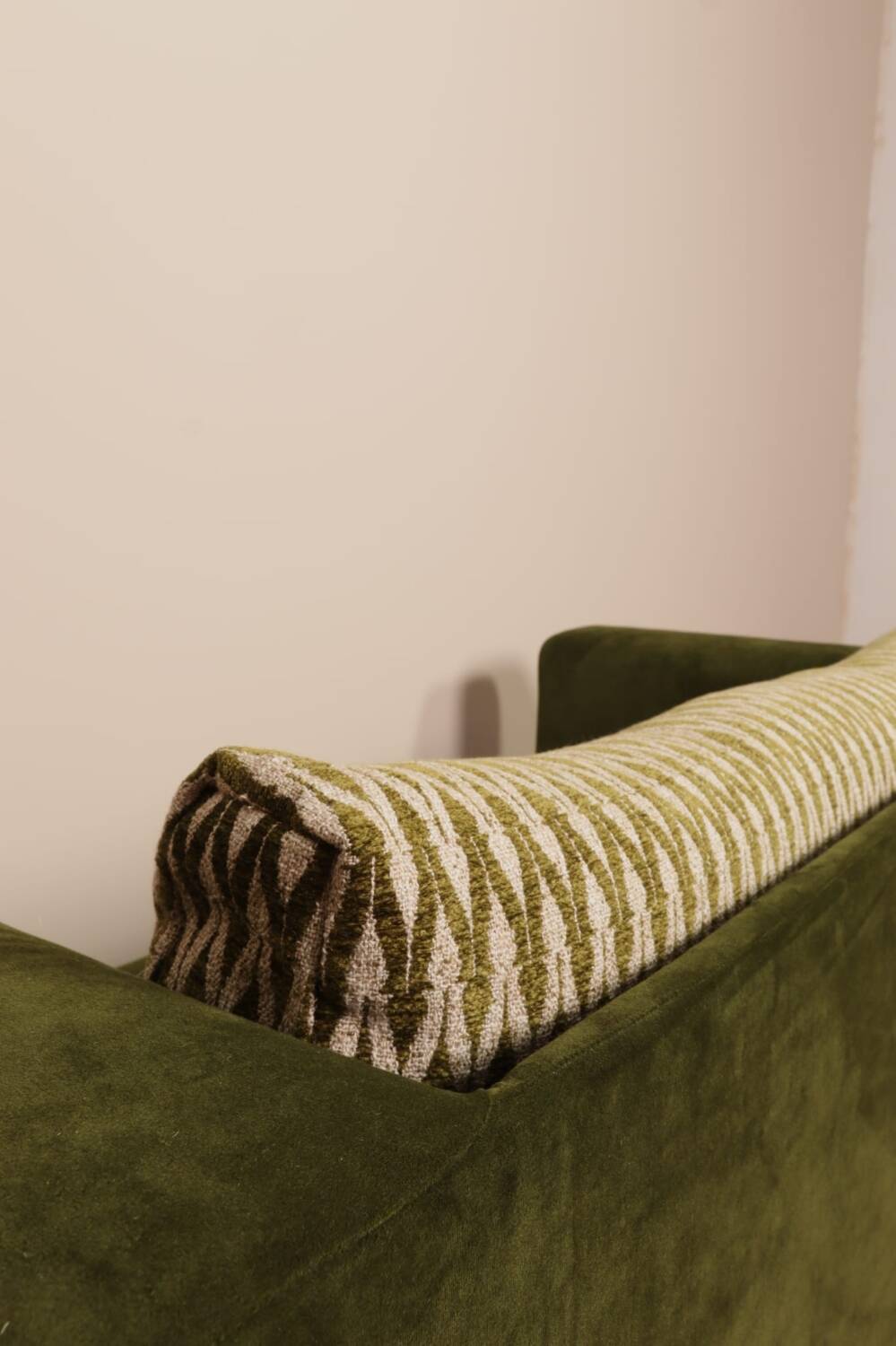 Olive velvet two-seater sofa