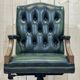 English chesterfield office armchair in green leather from the 1980s