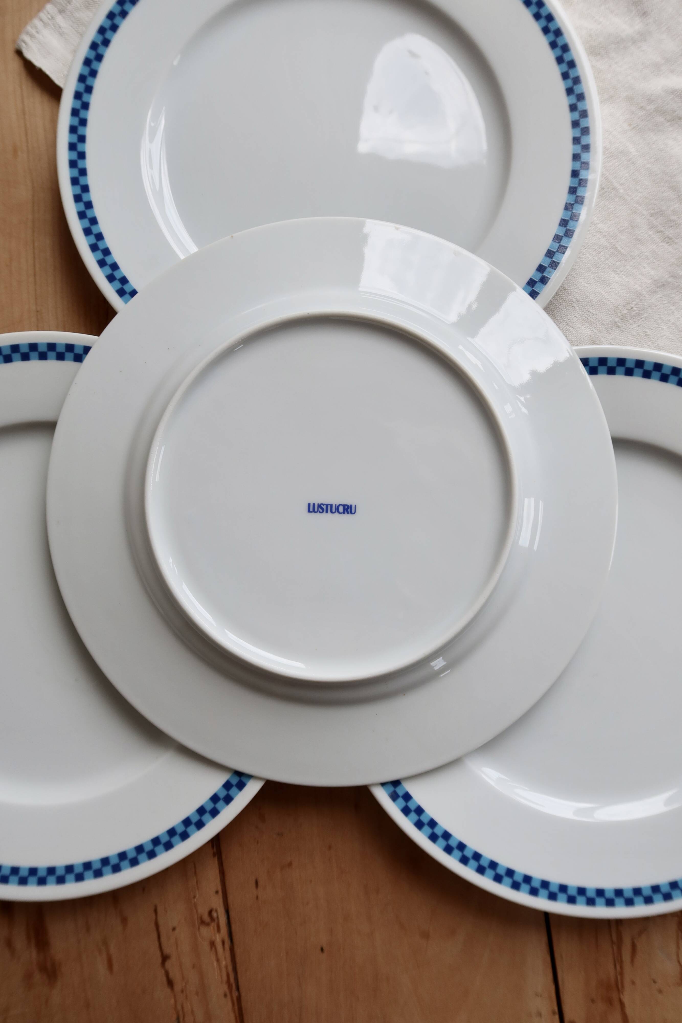 4 vintage Lustucru plates in porcelain with a blue checkered pattern.