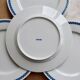 4 vintage Lustucru plates in porcelain with a blue checkered pattern.