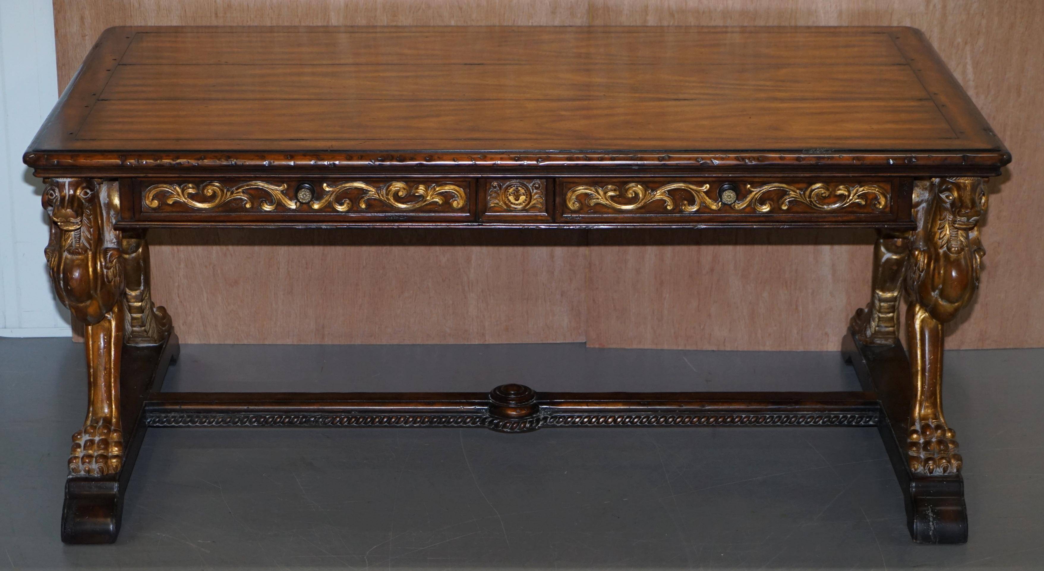 Double-sided writing desk in hardwood with gilt griffins, RJ Horner style.