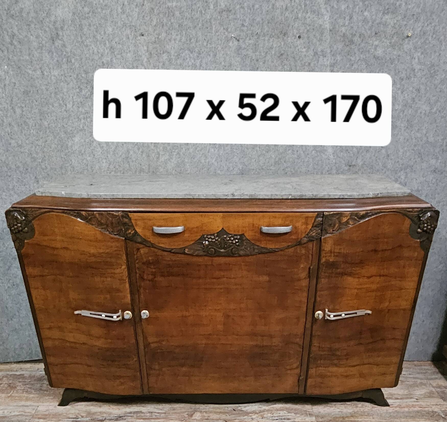 Sideboard in a row, Art Deco period, in mahogany.