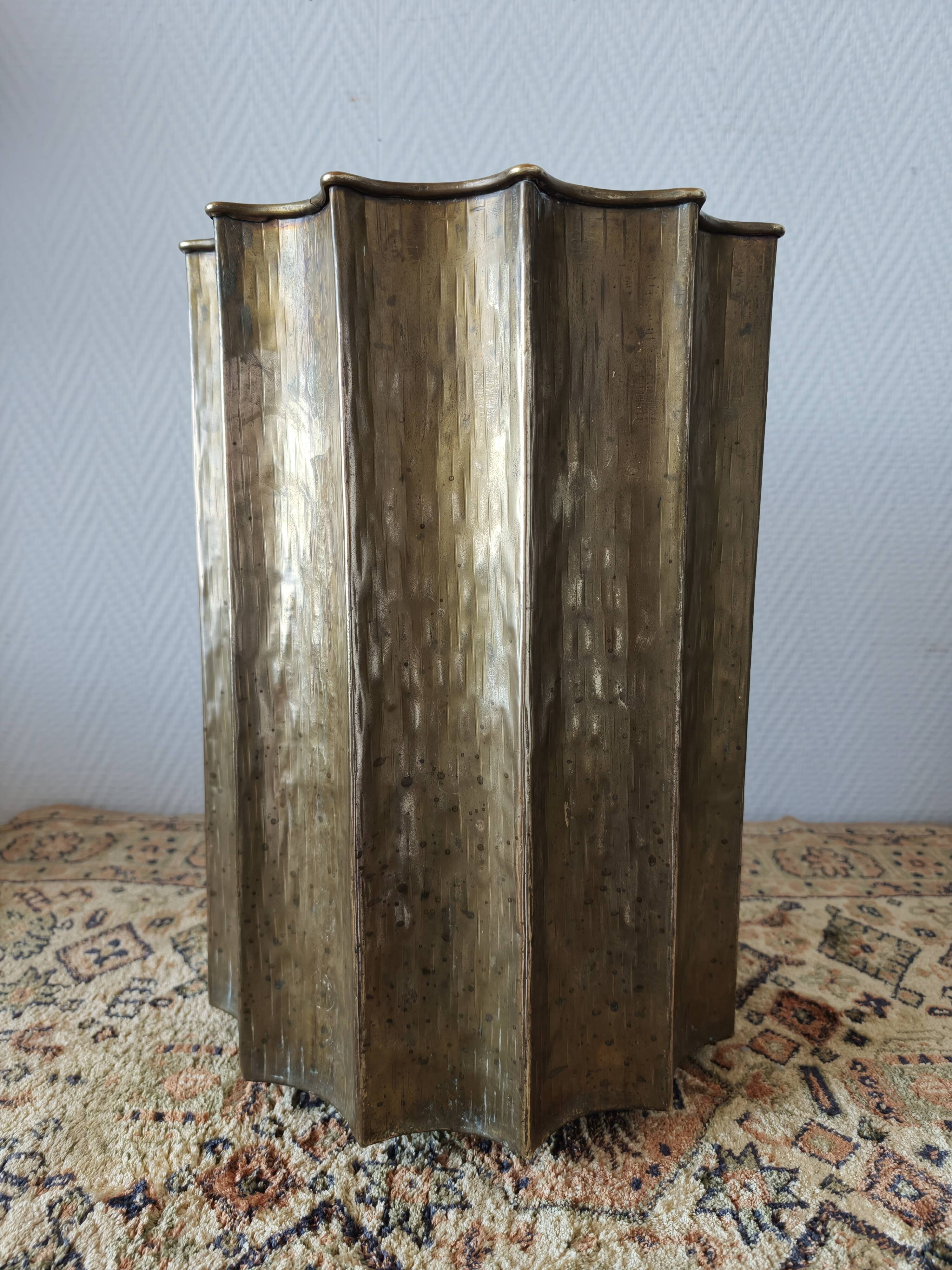 Egidio Casagrande umbrella stand in hammered brass, Italy, circa 1960.