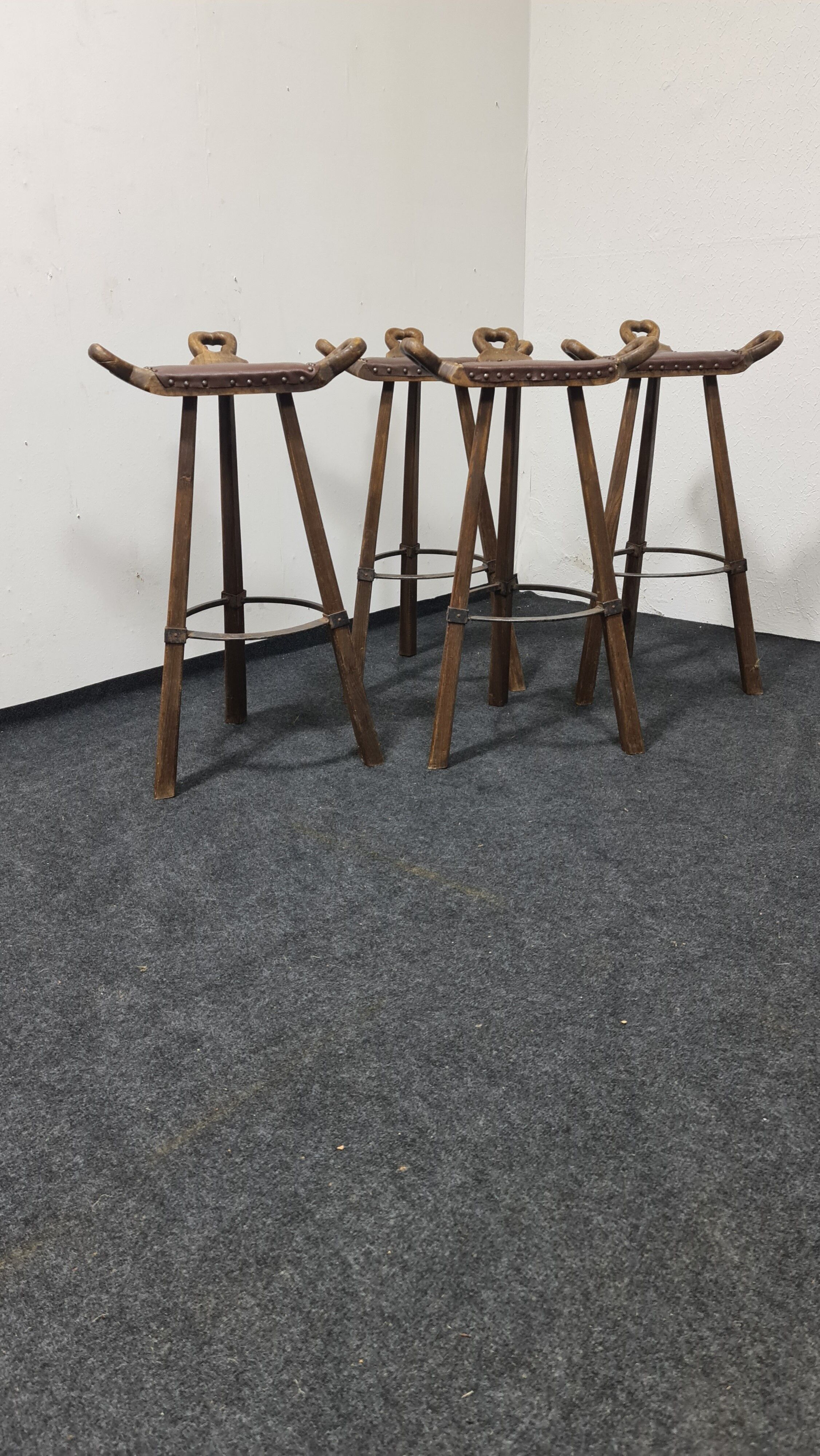 A set of four vintage Spanish Bar stool