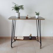 Vintage Formica and wrought iron rolling dessert trolley/side table.