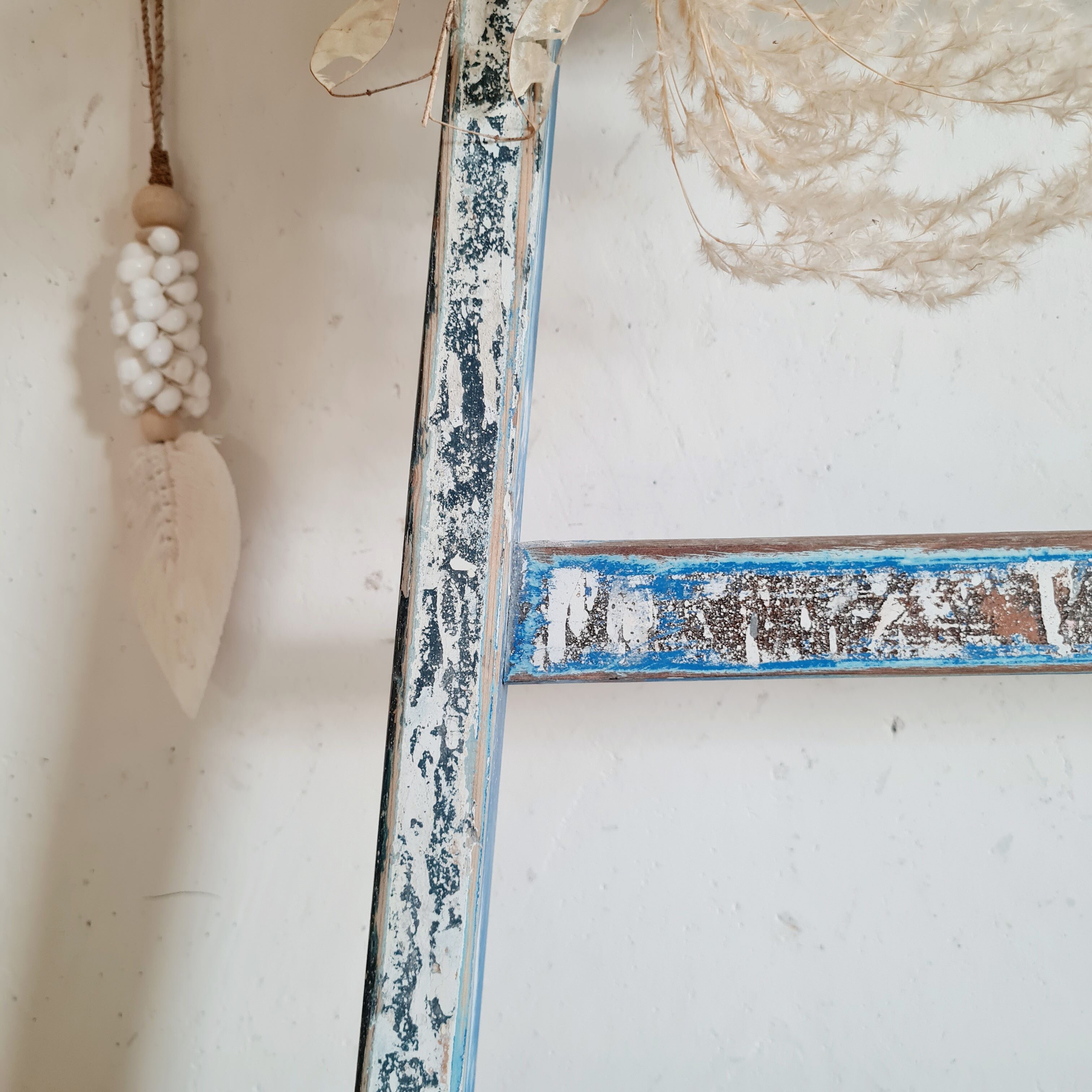Old blue wooden ladder