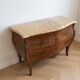 Curved Louis XV style commode in marquetry and marble.