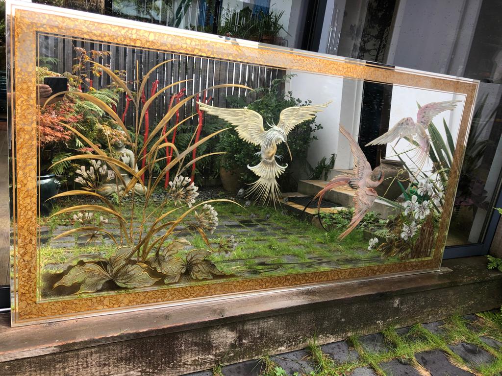 Mirror decorated with birds