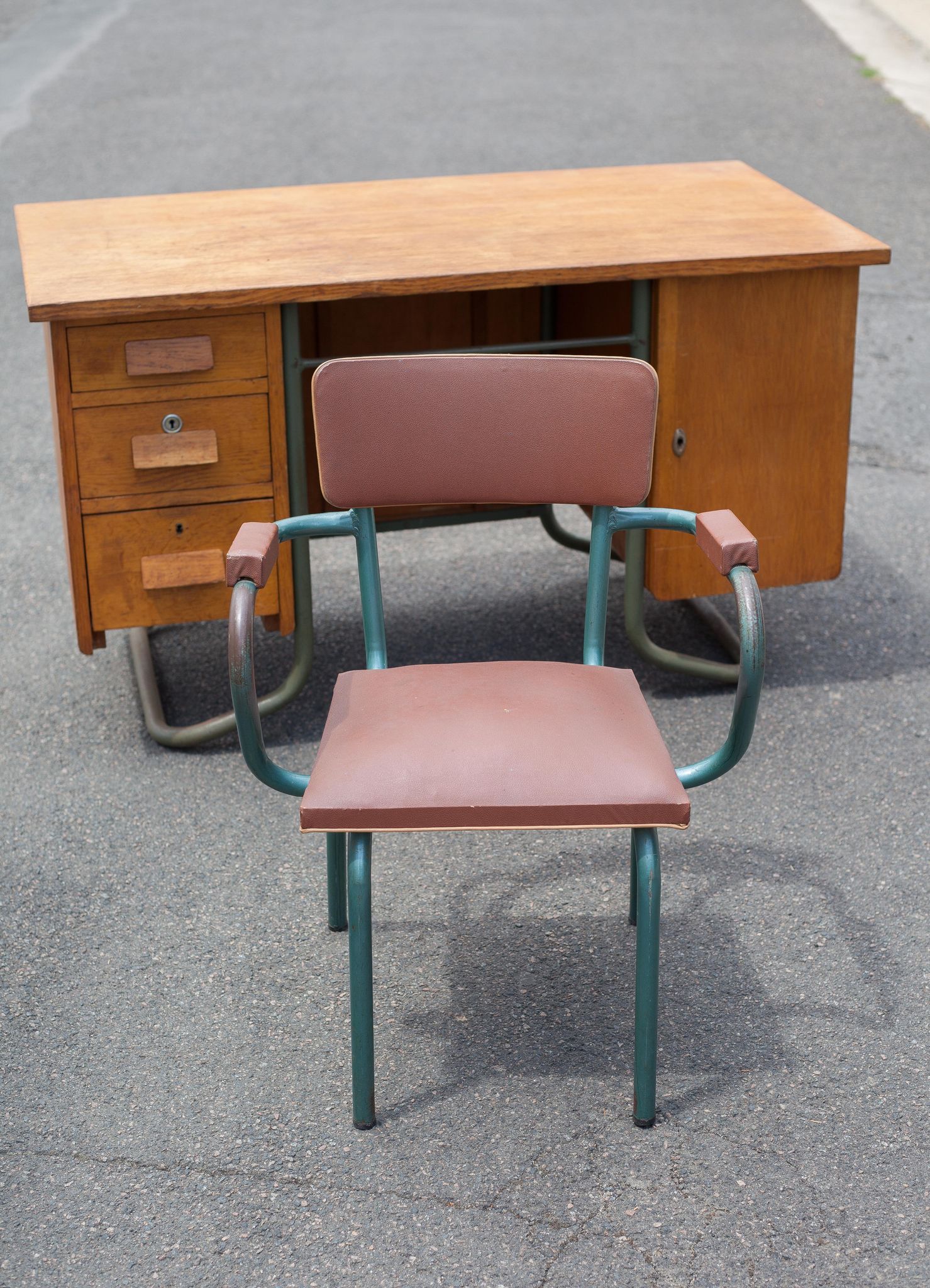 School teacher's chair in imitation leather and tubular metal