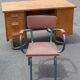 School teacher's chair in imitation leather and tubular metal