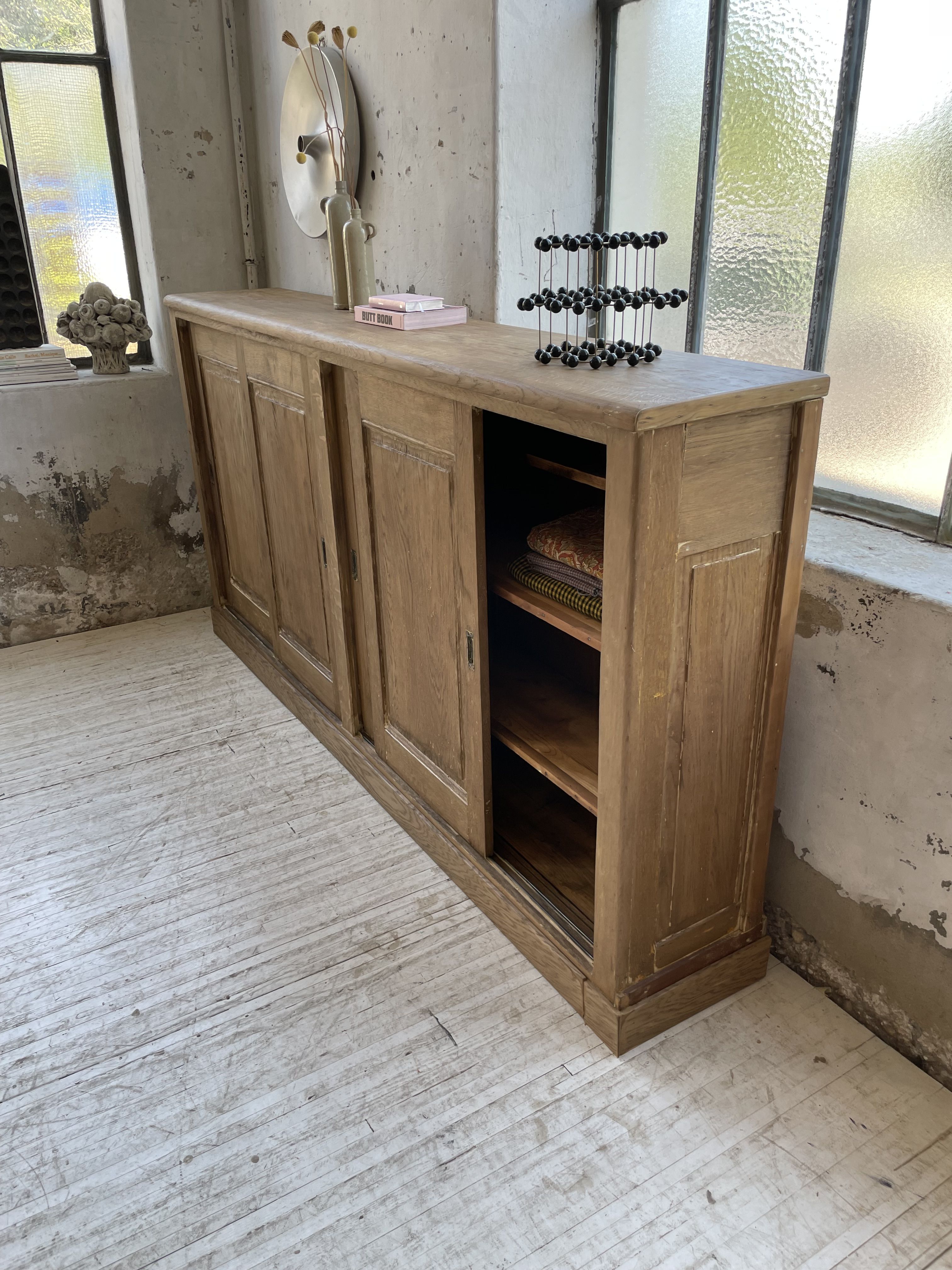 Large row of solid oak loom sliding doors