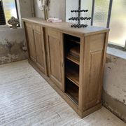 Large row of solid oak loom sliding doors