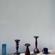 Trio of large turned wooden candlesticks